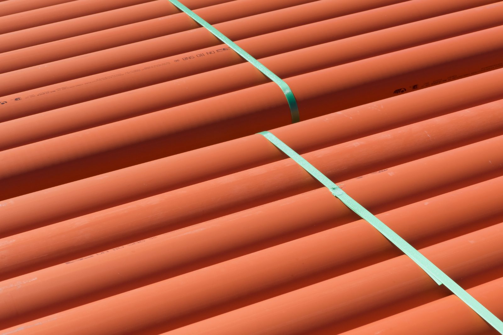 strapped bundles of plastic pressure pipe