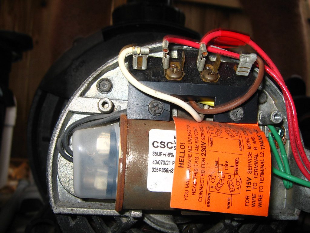 single-phase pool pump motor with wiring cover open
